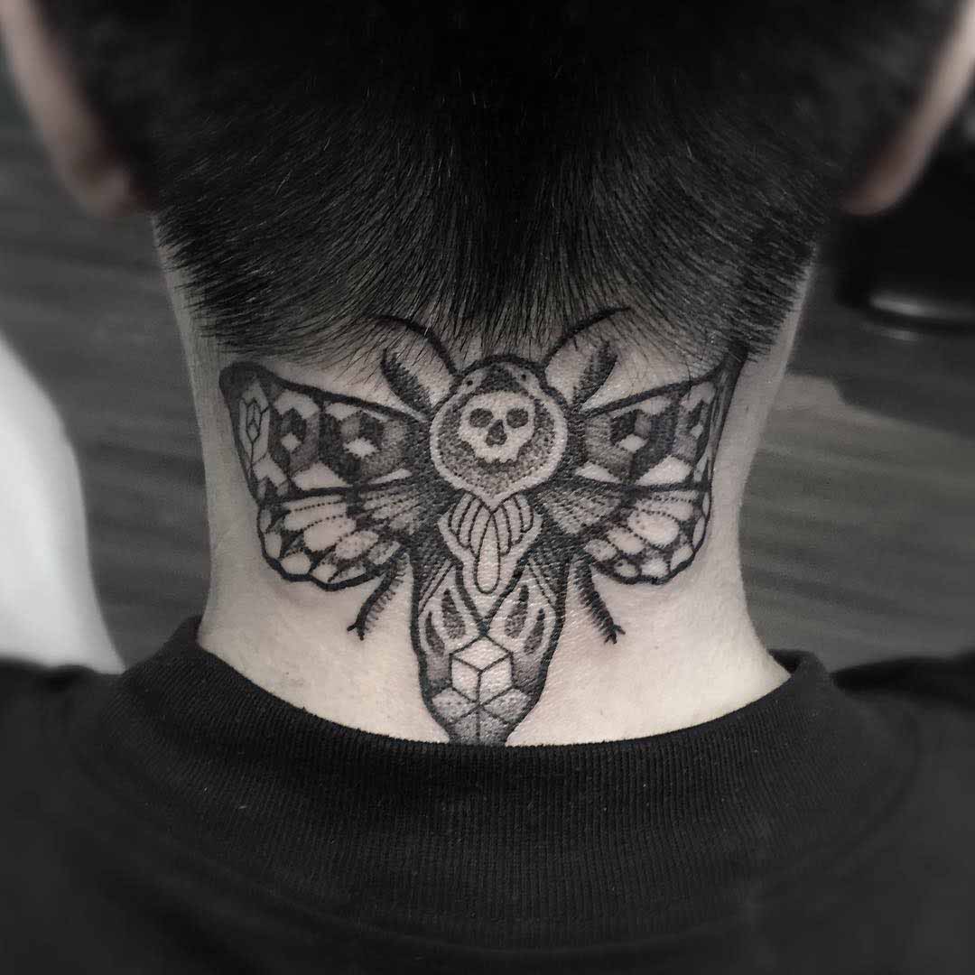 butterfly tattoo on back of neck